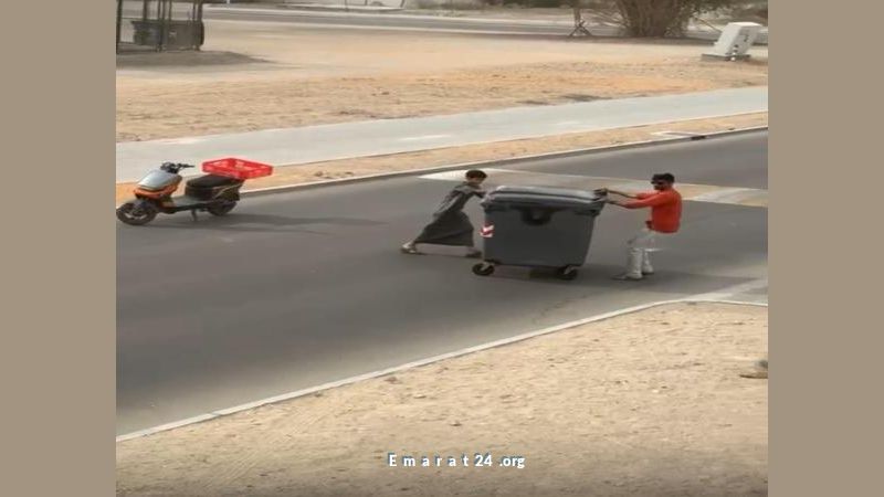 قصة إنسانية: طفل مواطن ومقيم يتعاونان لإبعاد حاوية من الطريق في العين قصة إنسانية: طفل مواطن ومقيم يتعاونان لإبعاد حاوية من الطريق في العين