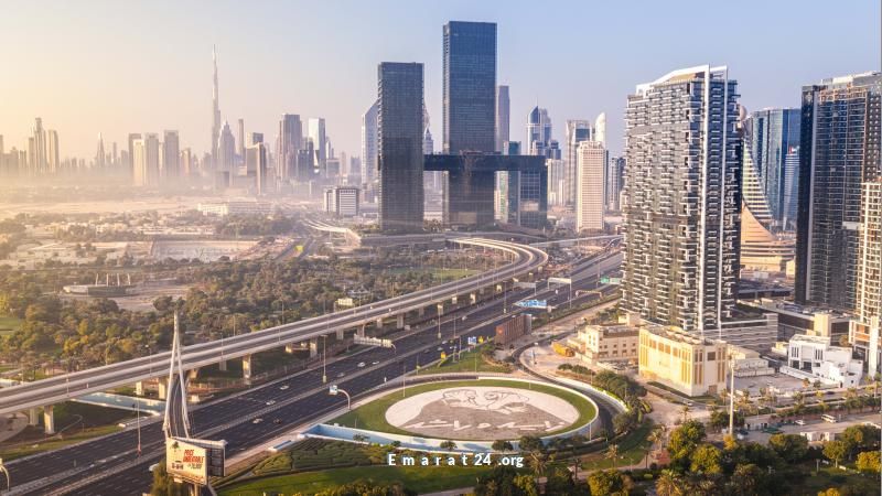 صورة زايد وراشد تضيء الدوار في محيط برواز دبي بقطر 82 متراً